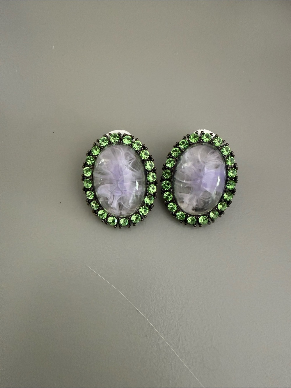 Two squirrel signed purple & green oval shaped stud Earrings